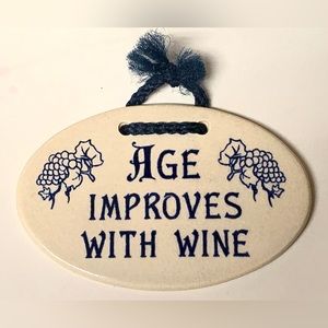 Mountain Meadows Pottery AGE IMPROVES WITH WINE Oval Ceramic Wall Plaque